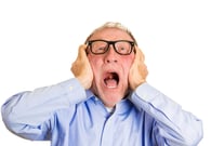 Closeup portrait, angry senior man, nerd black glasses, covering ears, looking up, to say, stop making that loud noise it's giving me a headache, isolated white background. Negative human emotion